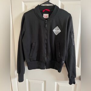 A black San Antonio spurs Sportiqe jacket